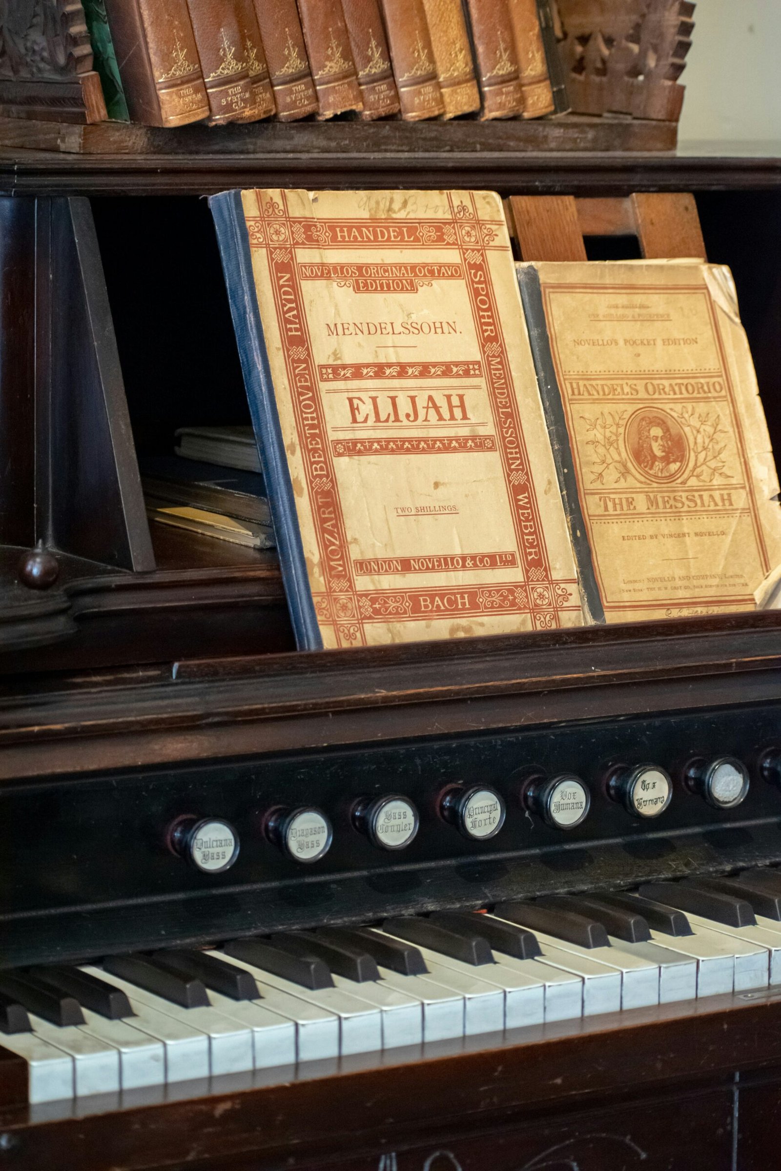 a piano with a book on top of it